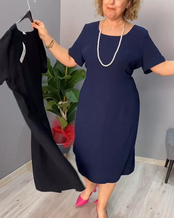 Enfärgad kortärmad elegant klänning