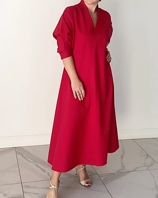 Enkel enfärgad v-ringad elegant klänning