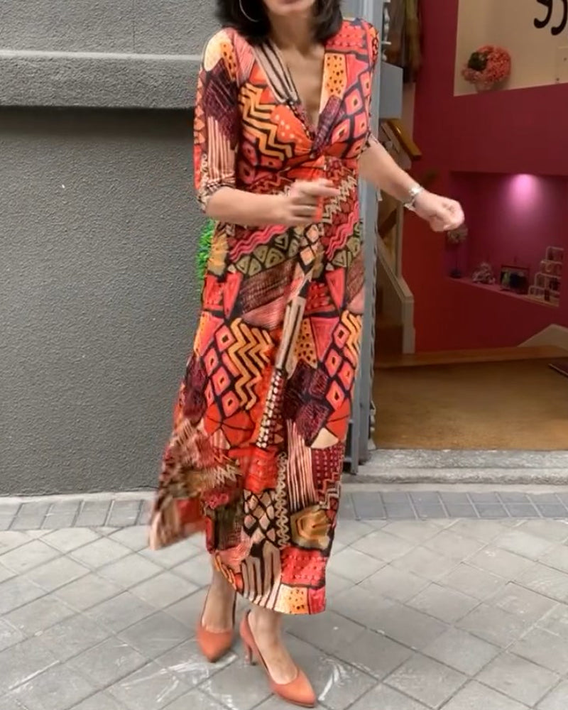 Halvärmad klänning med V-ringning och tryck