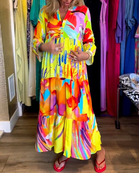 Klänning med utsvängd ärm och tryck