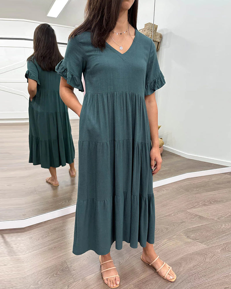 Klänning med lösa ärmar och paneler