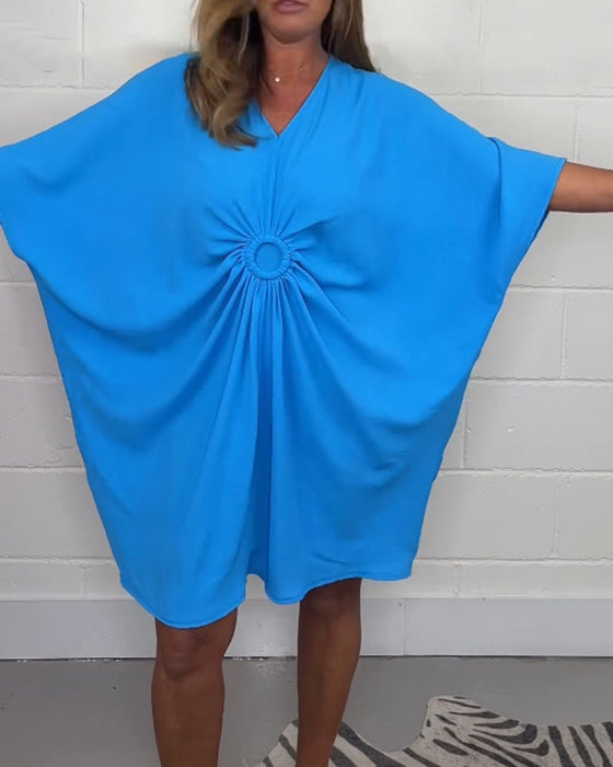 Fladdermusärm enfärgad klänning med V-ringad