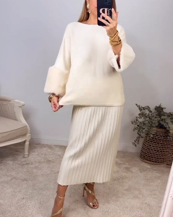 Elegant enfärgad pullover med långa ärmar