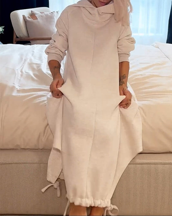 Enfärgad huvklänning med dragsnöre