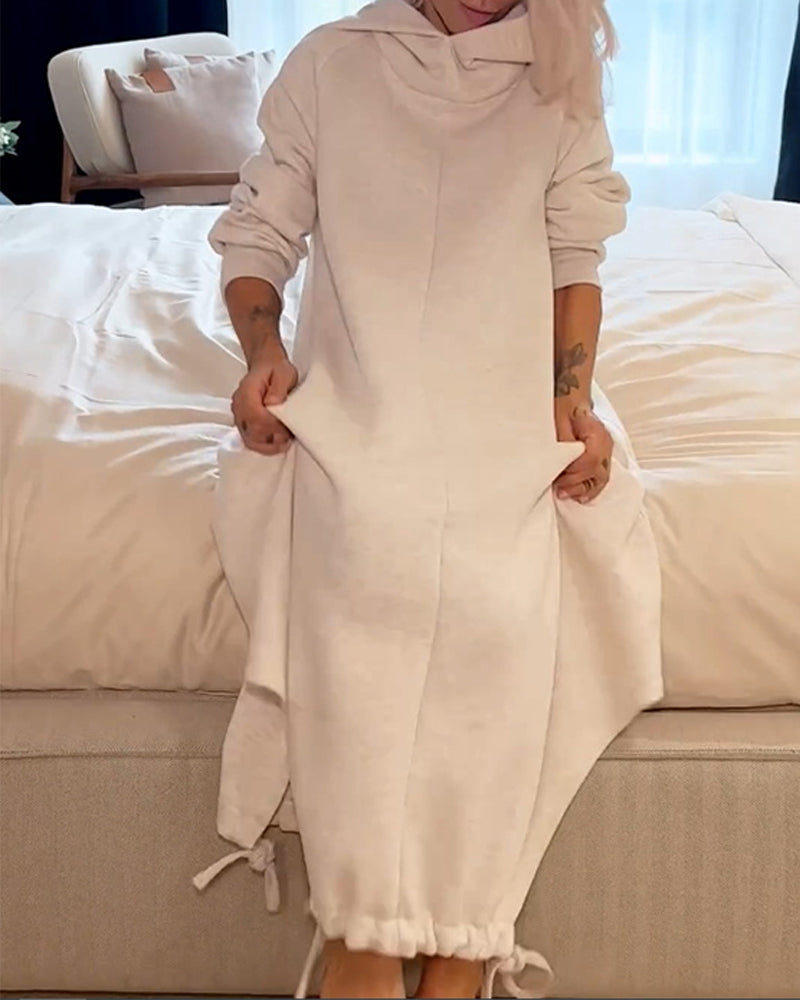 Enfärgad huvklänning med dragsnöre