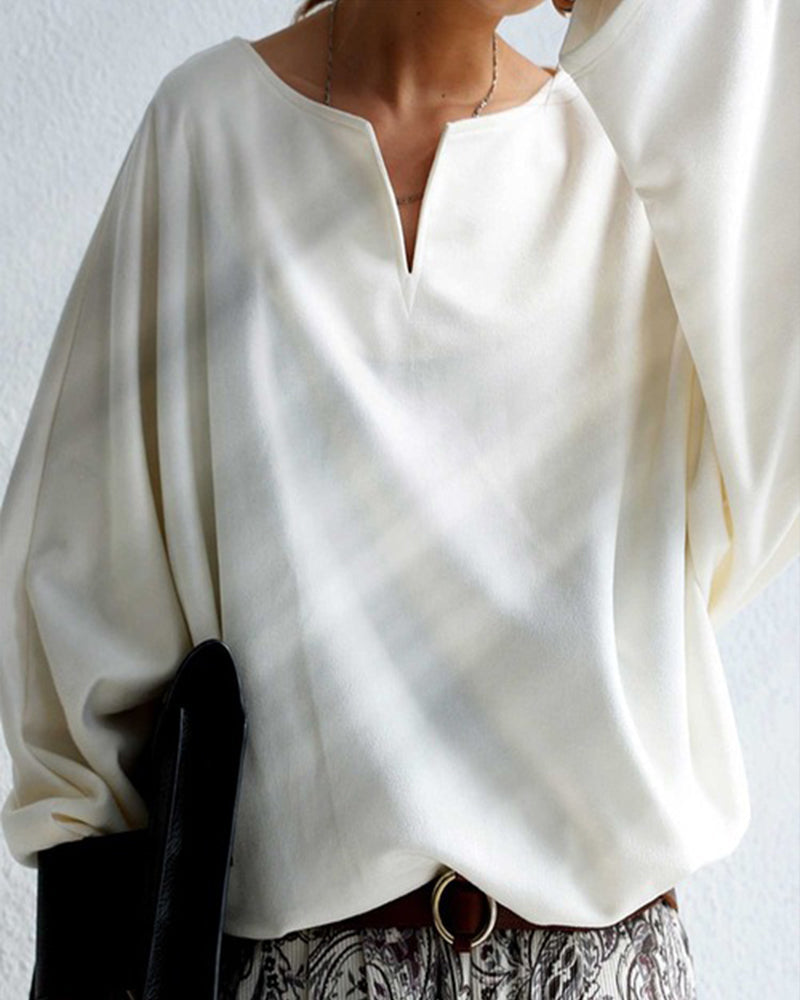 Lös v-ringad enfärgad topp