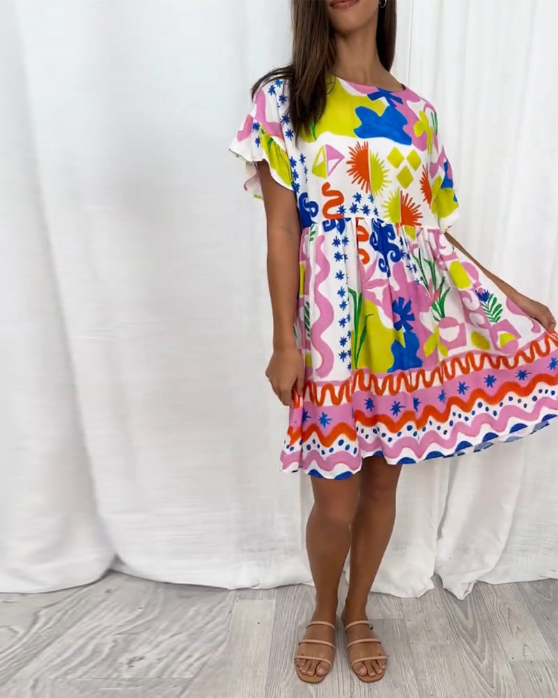 Kortärmad klänning med tryck och rund hals