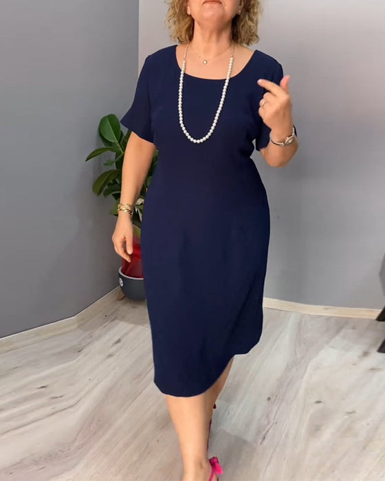 Enfärgad kortärmad elegant klänning