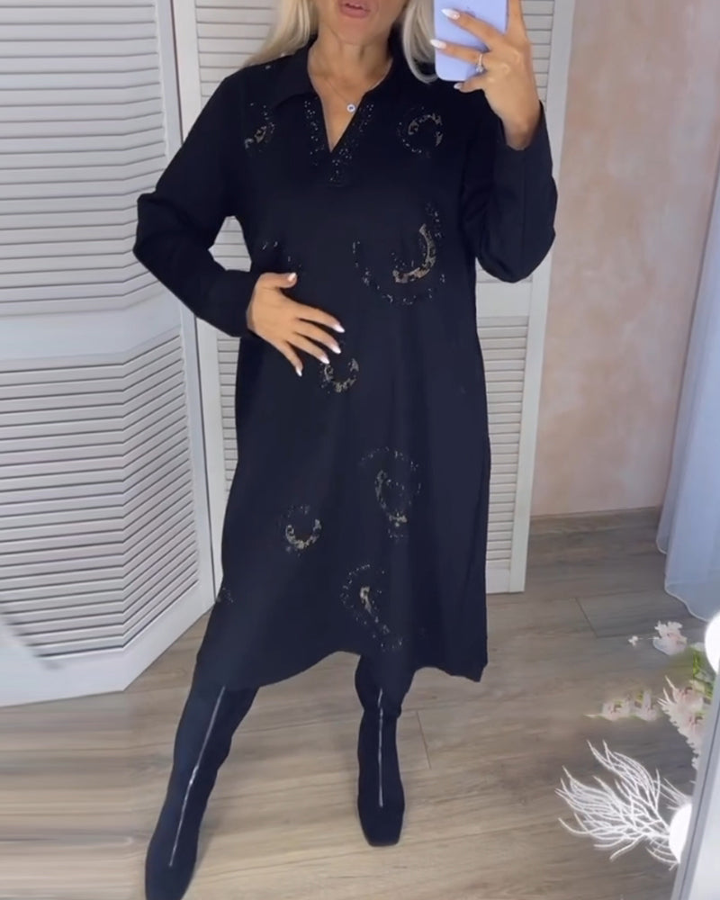 Långärmad midiklänning med slag