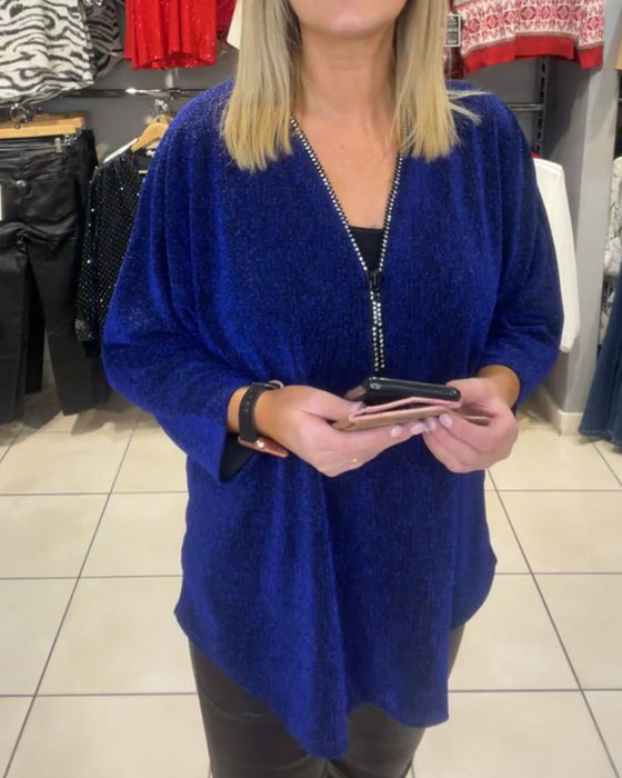 Löst topp med långa ärmar och dragkedja