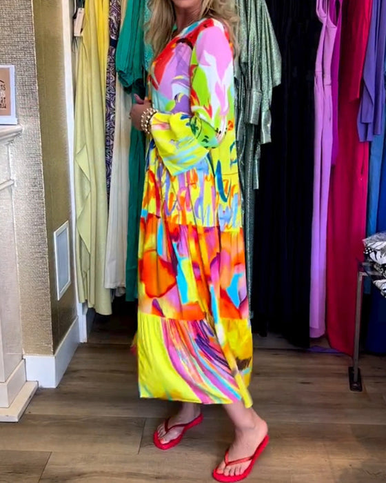 Klänning med utsvängd ärm och tryck