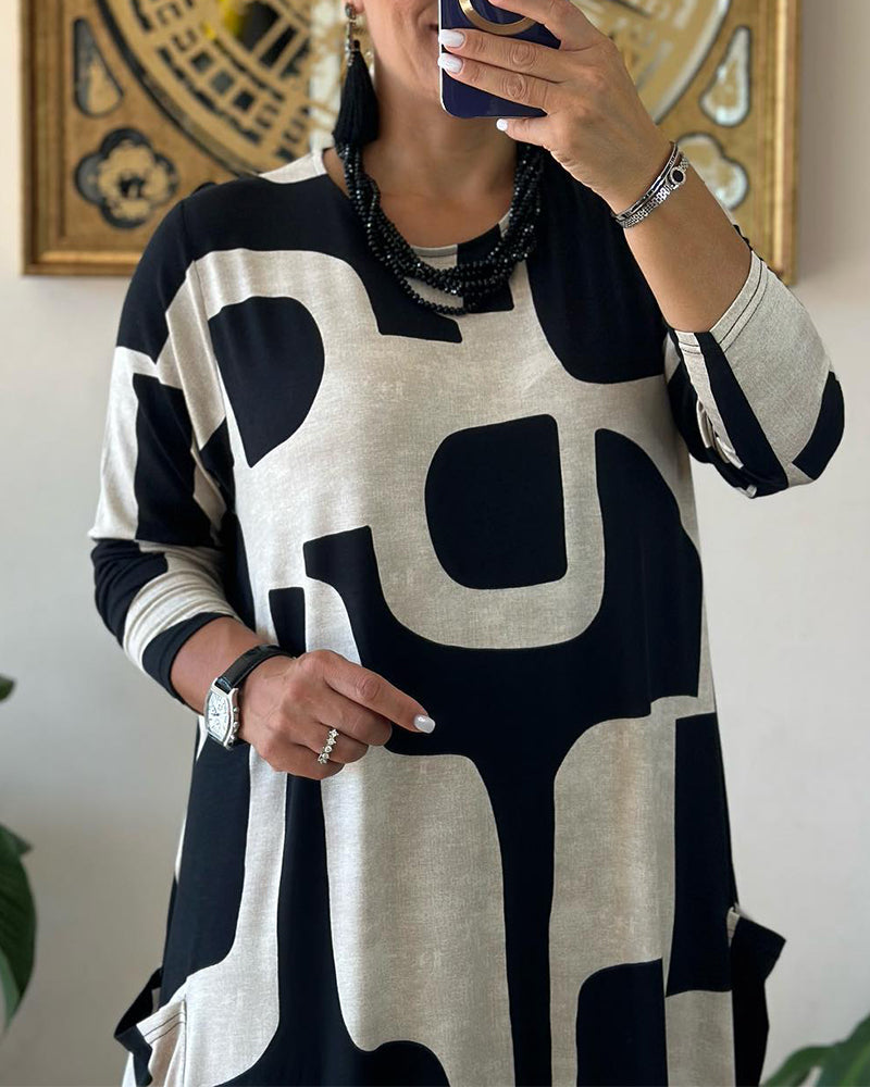 Klänning med långa ärmar och tryck