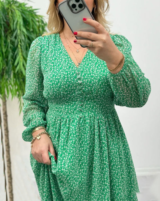 Elegant klänning med tryck