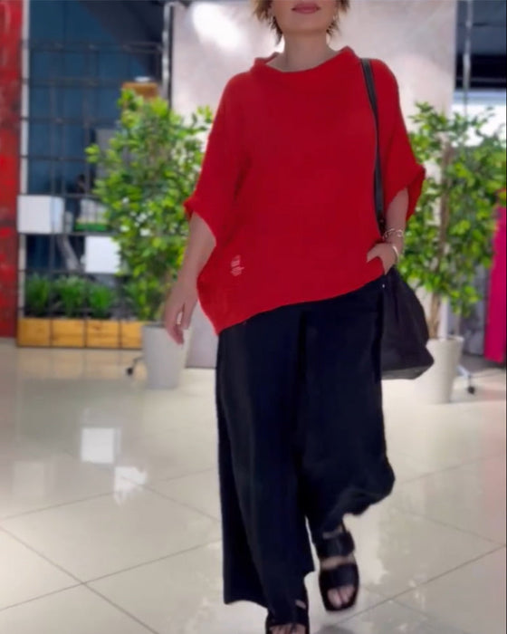 Enfärgad topp med hög halsringning