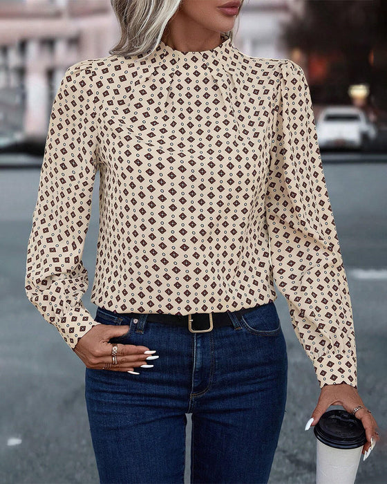 Blus med vintagestil och tryck