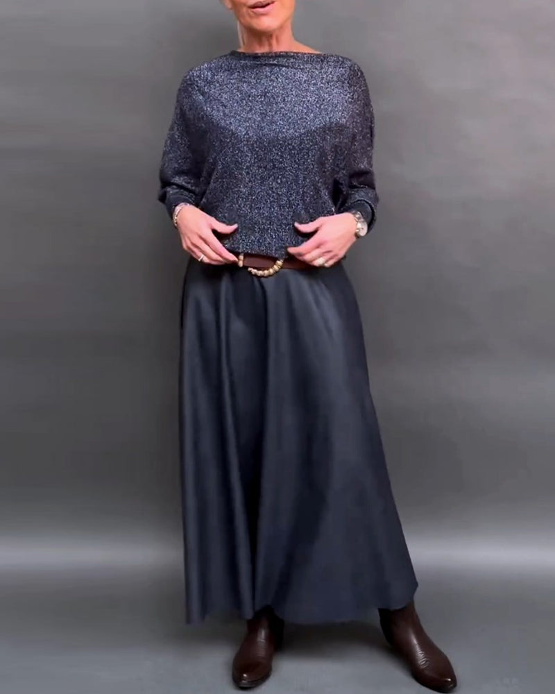 Glänsande topp med rund hals och dolmanärm