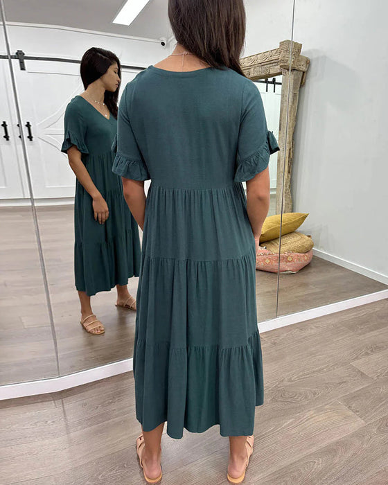 Klänning med lösa ärmar och paneler