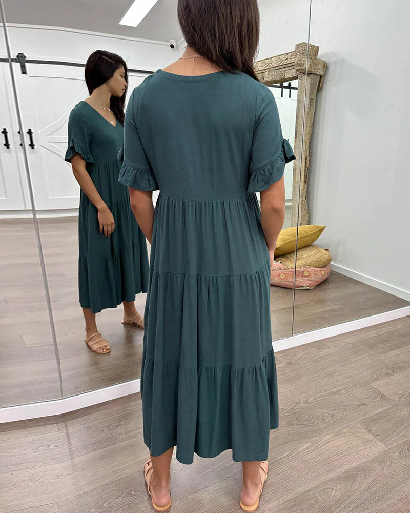 Klänning med lösa ärmar och paneler