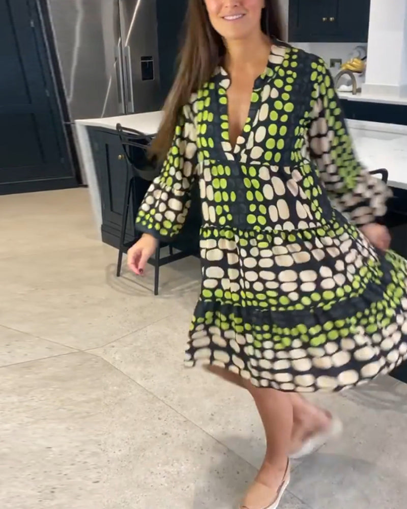 Fritidsklänning med djup v-tryck