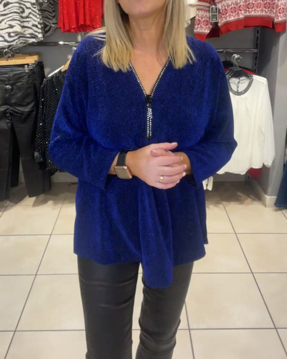 Löst topp med långa ärmar och dragkedja