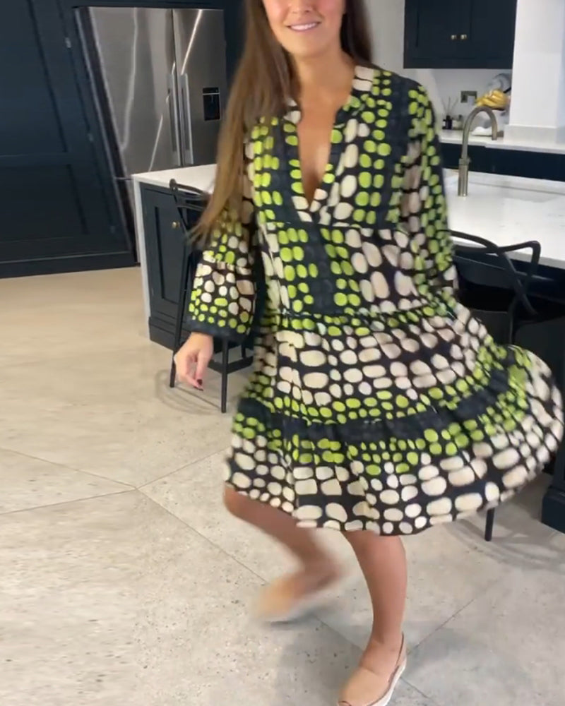 Fritidsklänning med djup v-tryck