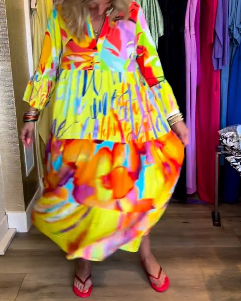 Klänning med utsvängd ärm och tryck