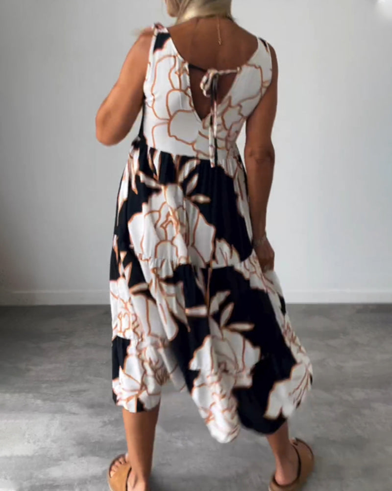 Klänning med ärmar och blommönster