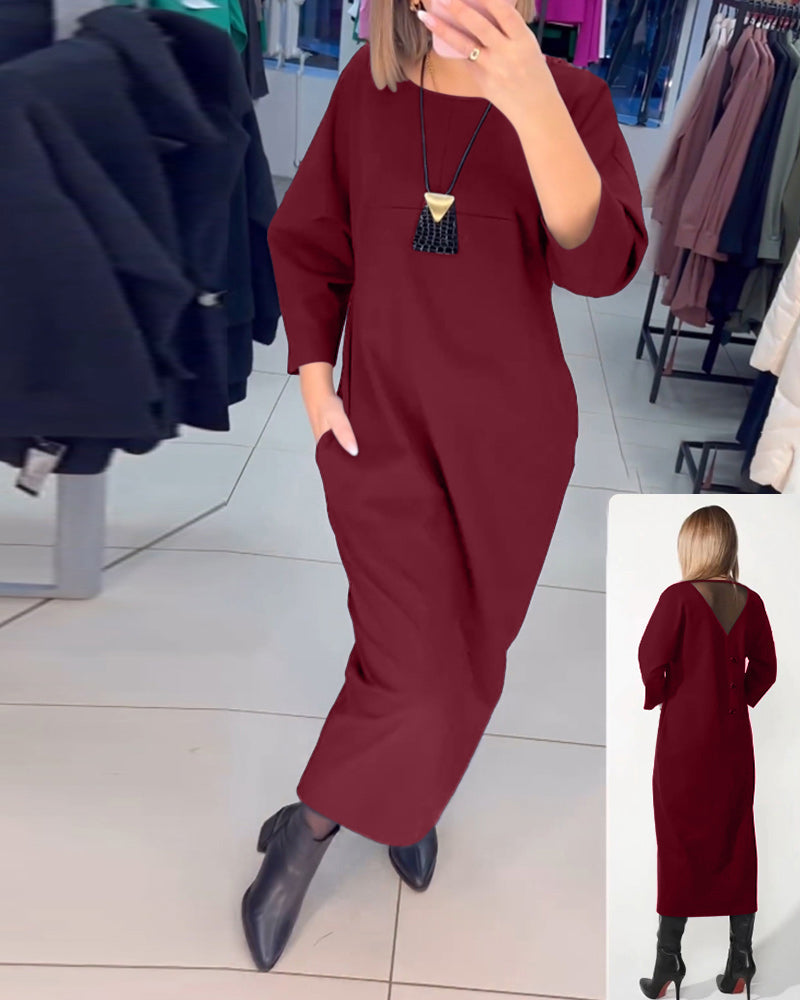 Klänning med långa ärmar och fickor