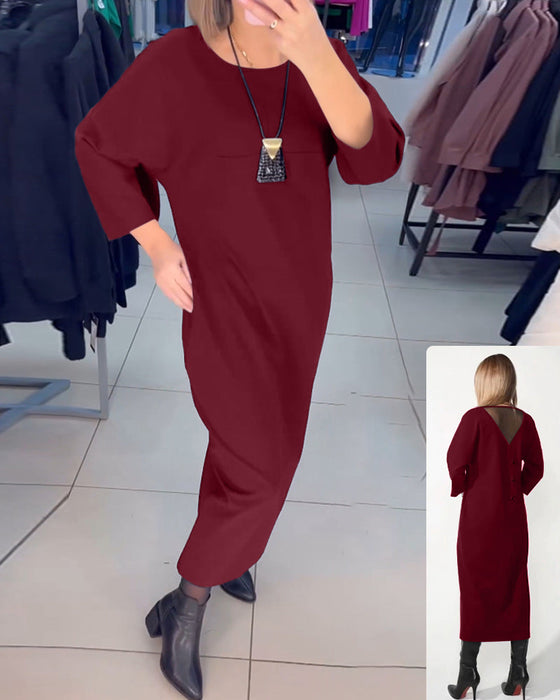 Klänning med långa ärmar och fickor