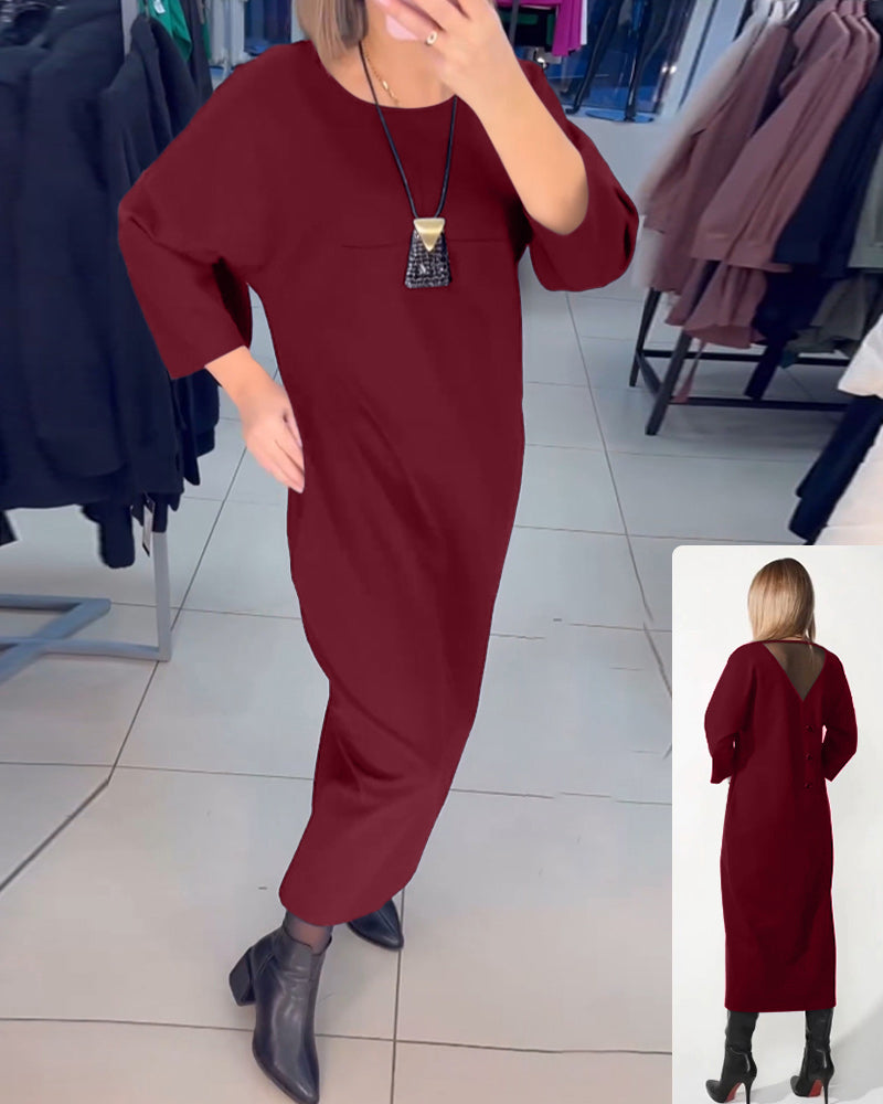 Klänning med långa ärmar och fickor