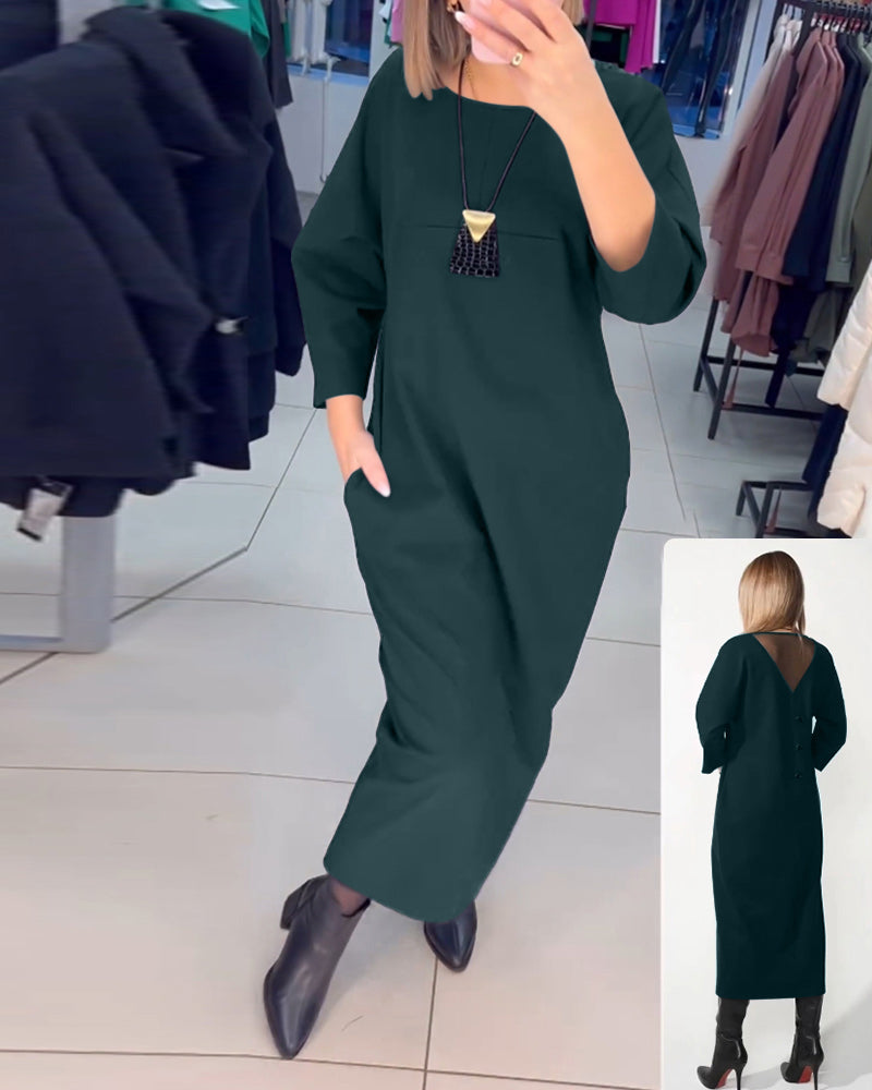 Klänning med långa ärmar och fickor