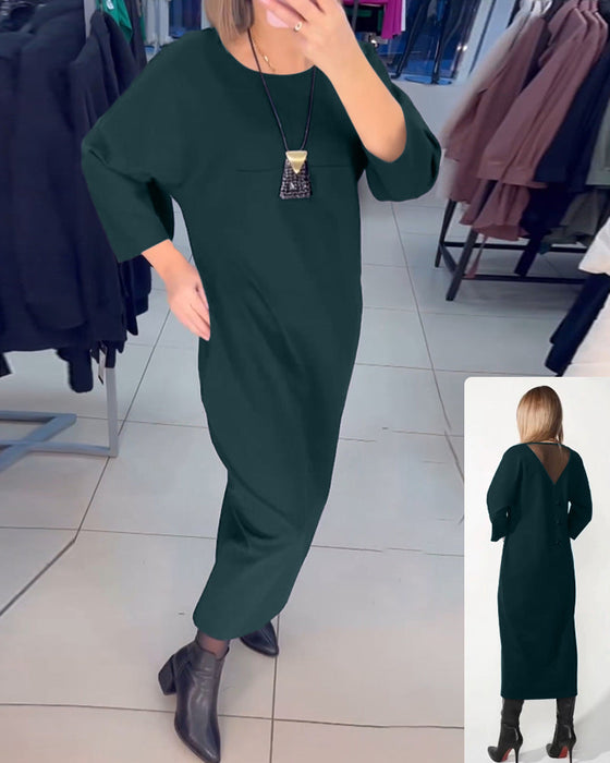 Klänning med långa ärmar och fickor