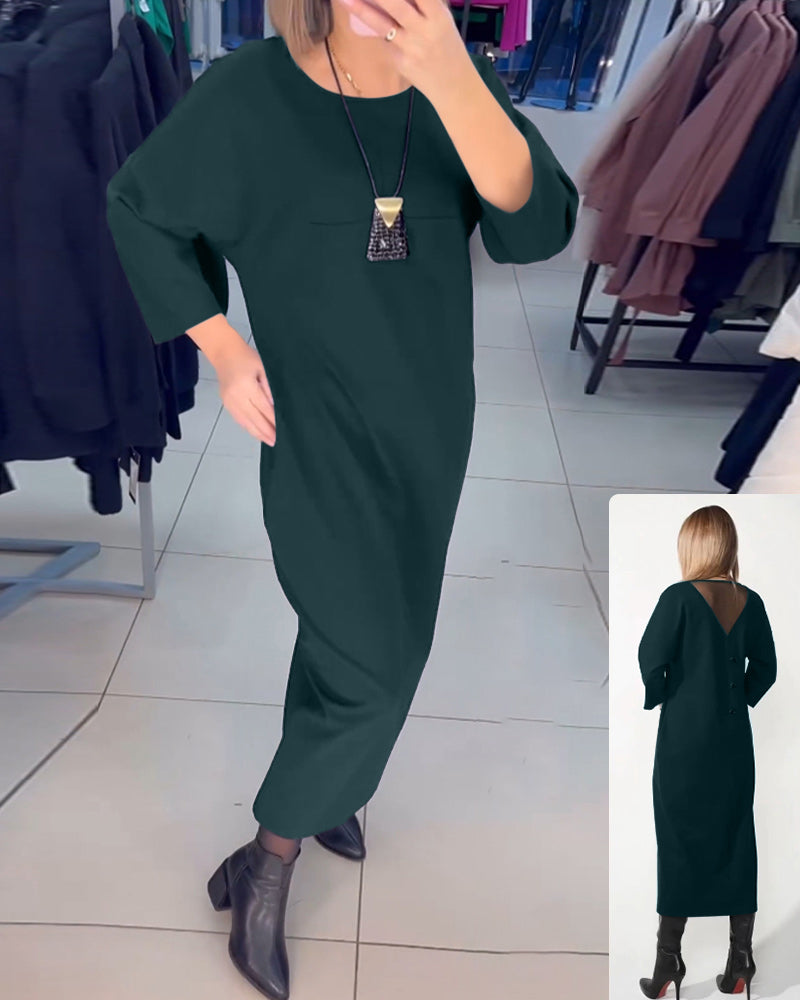 Klänning med långa ärmar och fickor