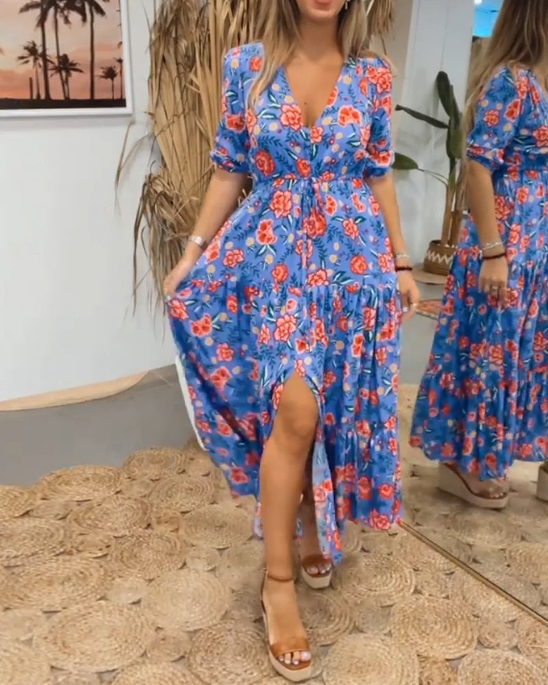 Klänning med rosentryck och slitsar