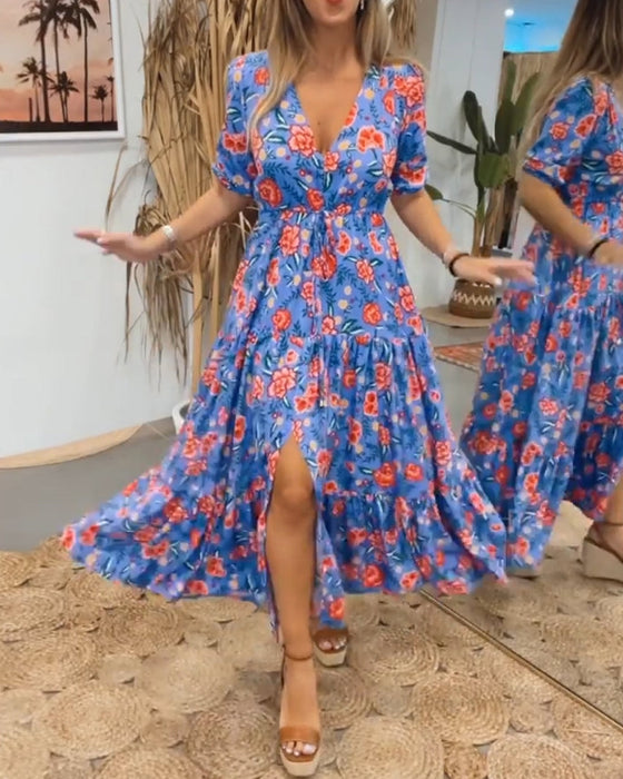 Klänning med rosentryck och slitsar