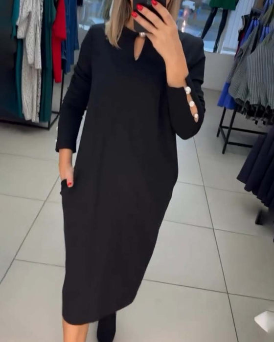 Elegant klänning med pärlknappar