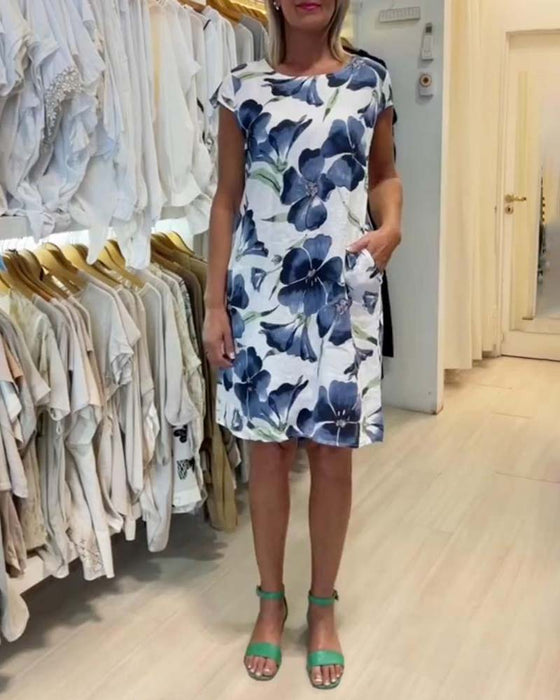 Kortärmad klänning med blommönster