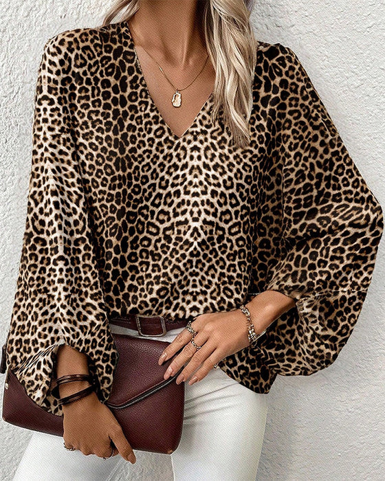 Trendig leopardmönstrad topp med V-ringad lanternärm
