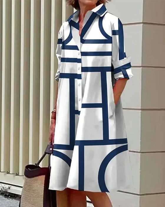 Klänning med fickor och geometriskt tryck