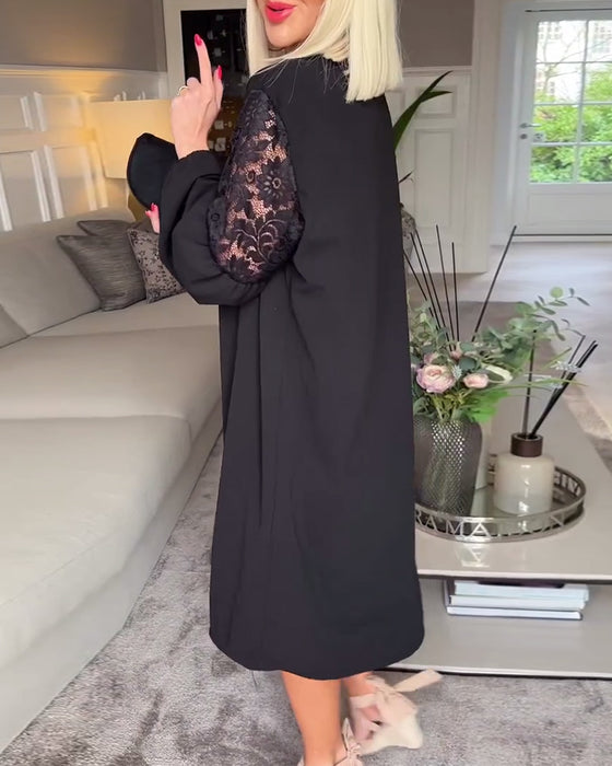 Elegant V-ringad långärmad klänning i spets