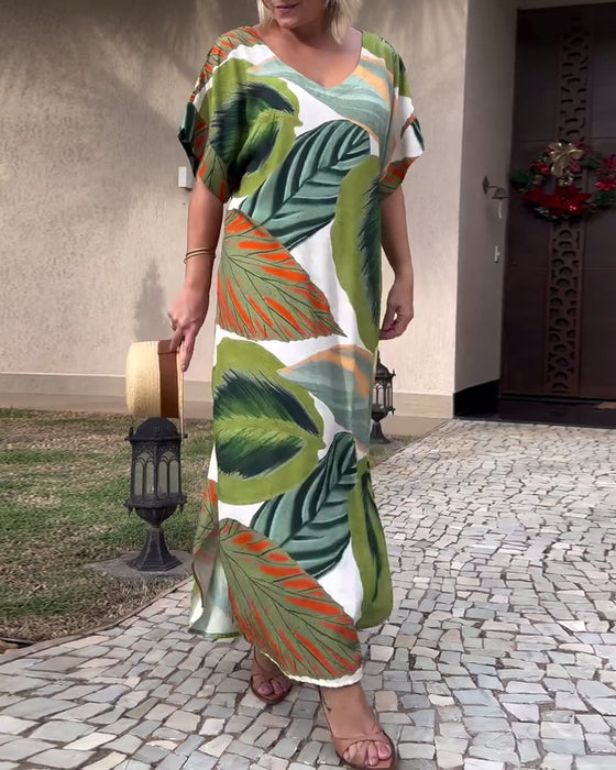 Kortärmad avslappnad klänning med slits