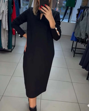 Elegant klänning med pärlknappar