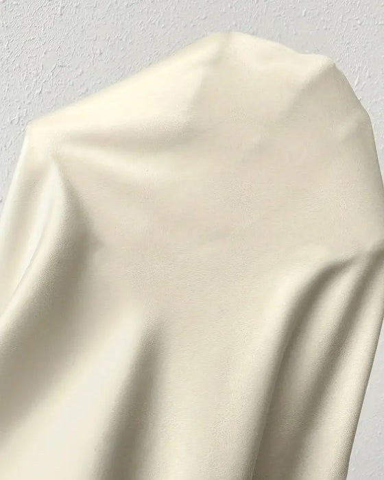Casual enfärgad oregelbunden blus med veck och lång ärm