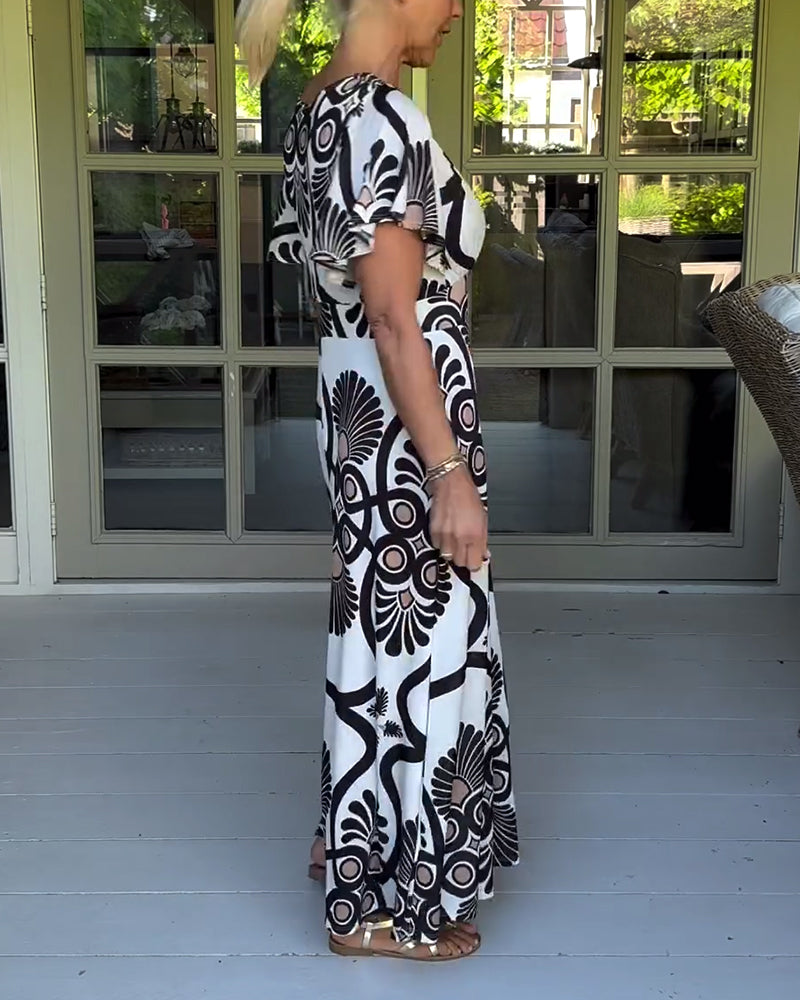 Kortärmad klänning med vintagetryck