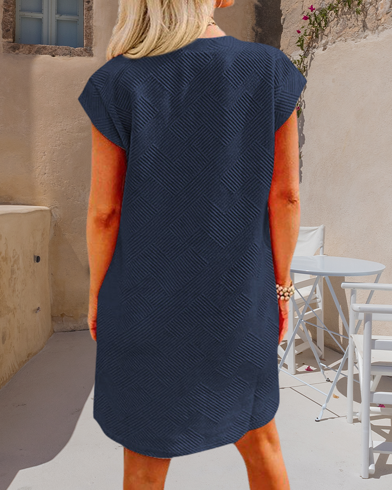 Kortärmad klänning med rund halsficka