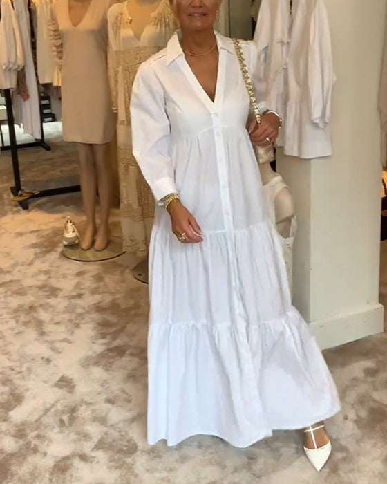 Klänning med knappar och slag