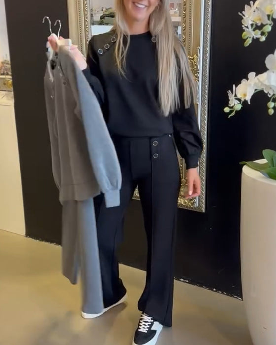 Tvådelat set - enfärgad blus och byxor med rund hals