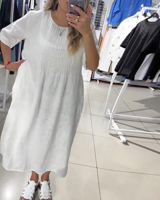 Casual lös klänning med enfärgad och halvärm