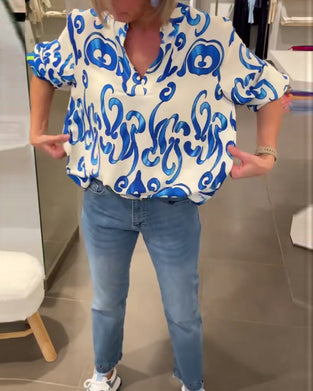 Elegant långärmad topp med tryckt V-ringning