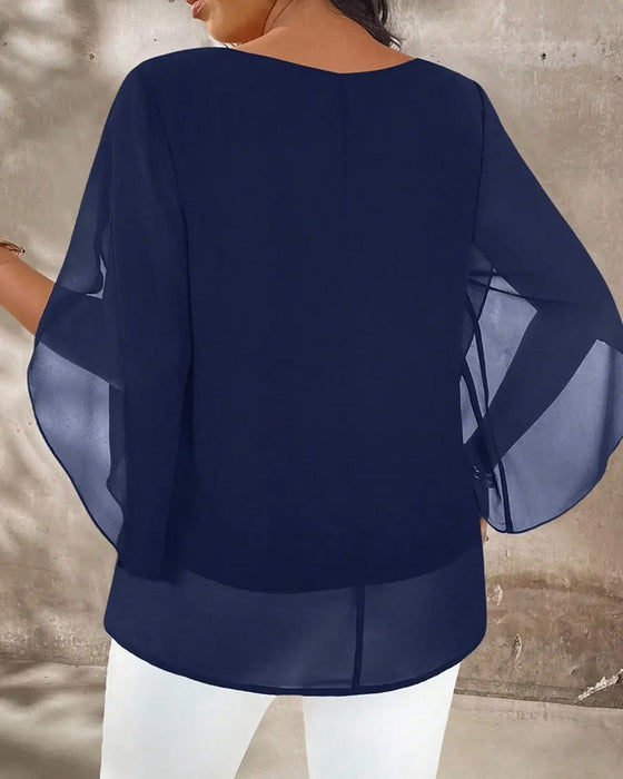 Blus Rundhalsad Oregelbunden Solid